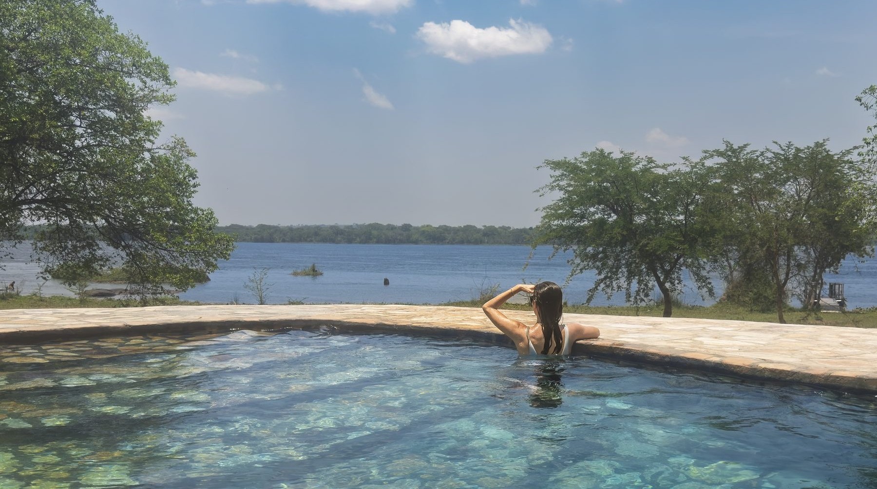 Pool at Anyadwe House looking out to the Nile